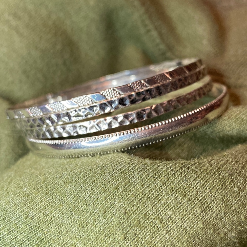 Silver toned bangle bracelets